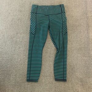 Athleta size small petite navy and Kelly green striped leggings